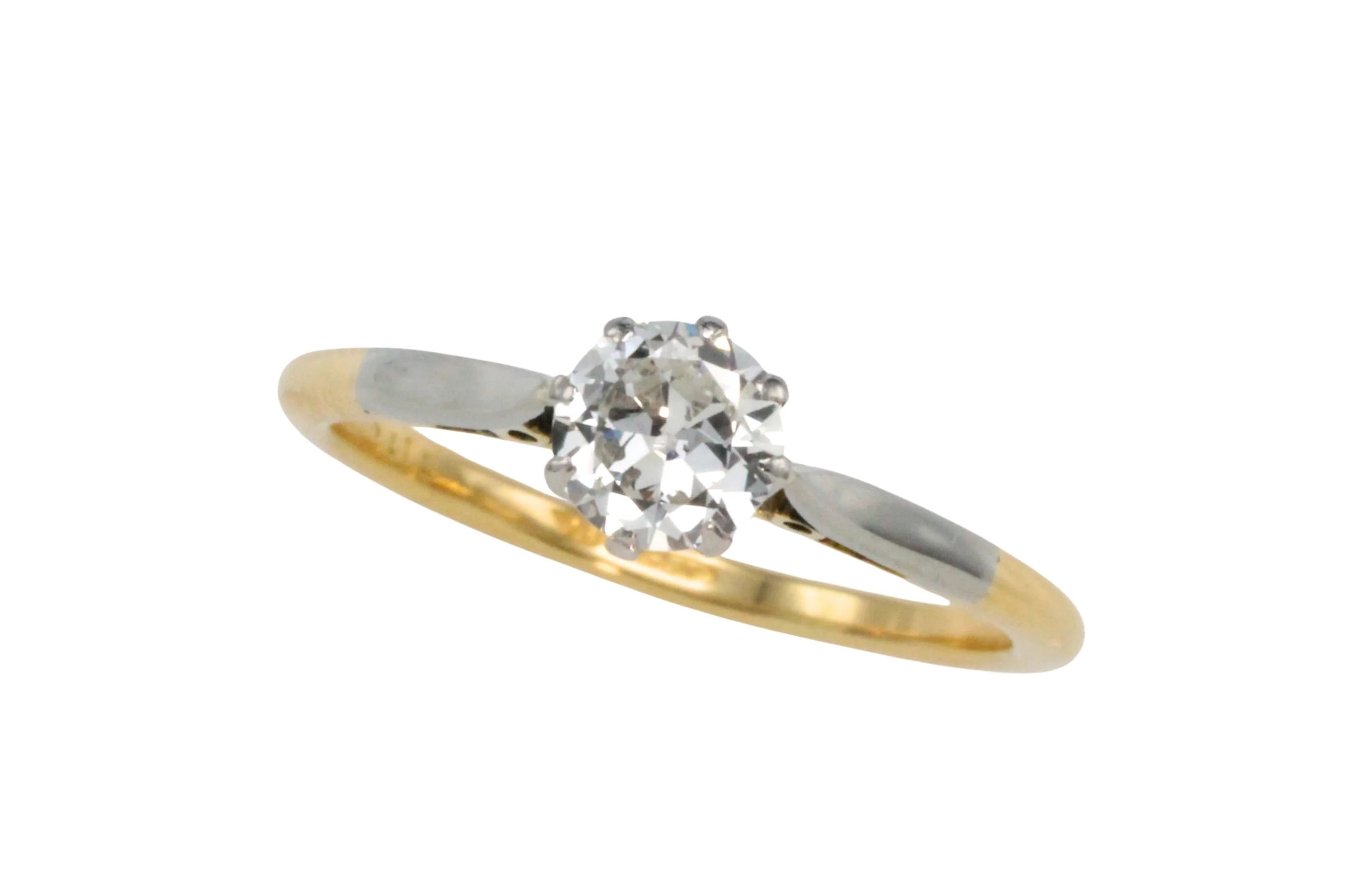 Diamond solitaire ring in platinum and gold