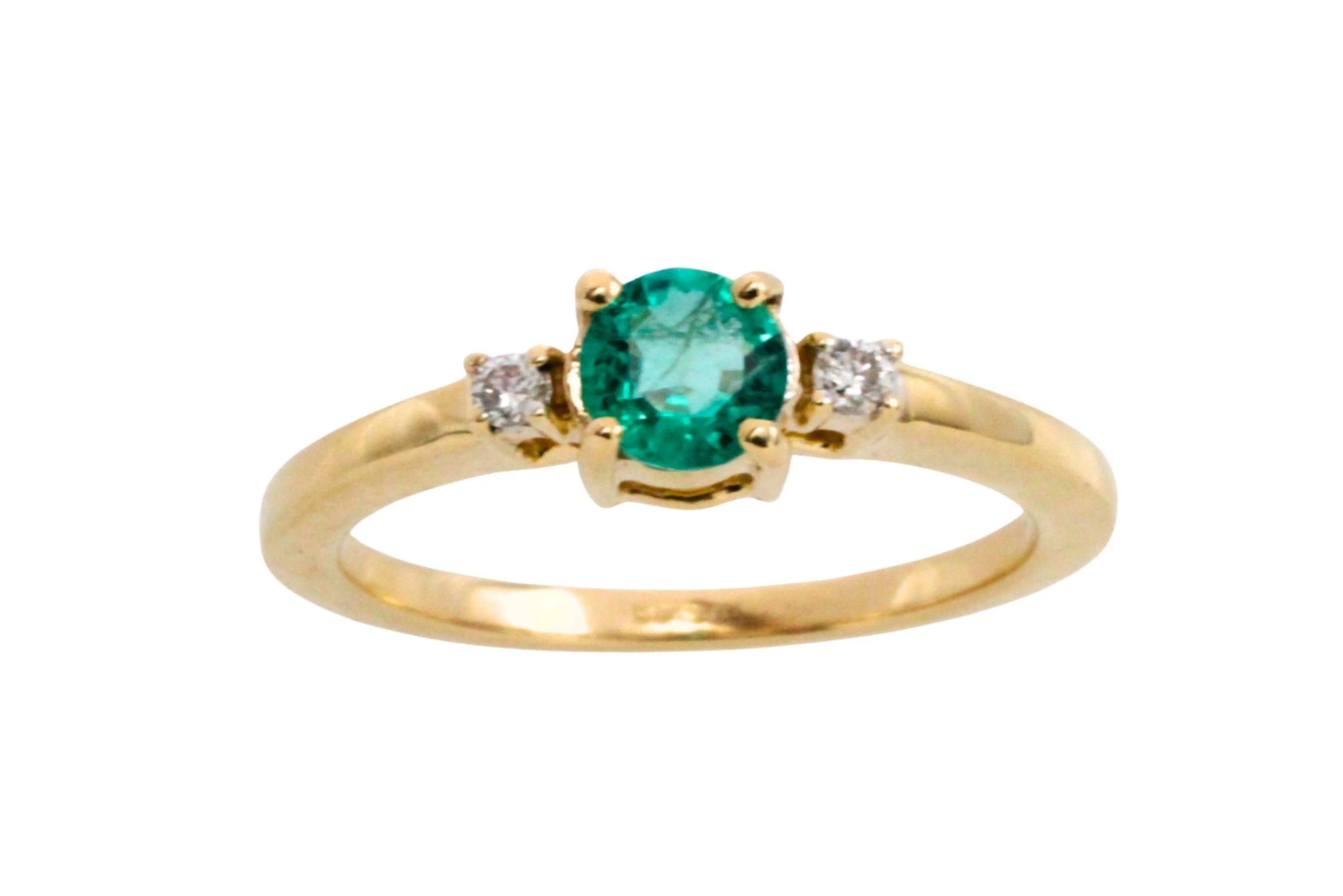 Emerald and diamond ring in 14 carat gold