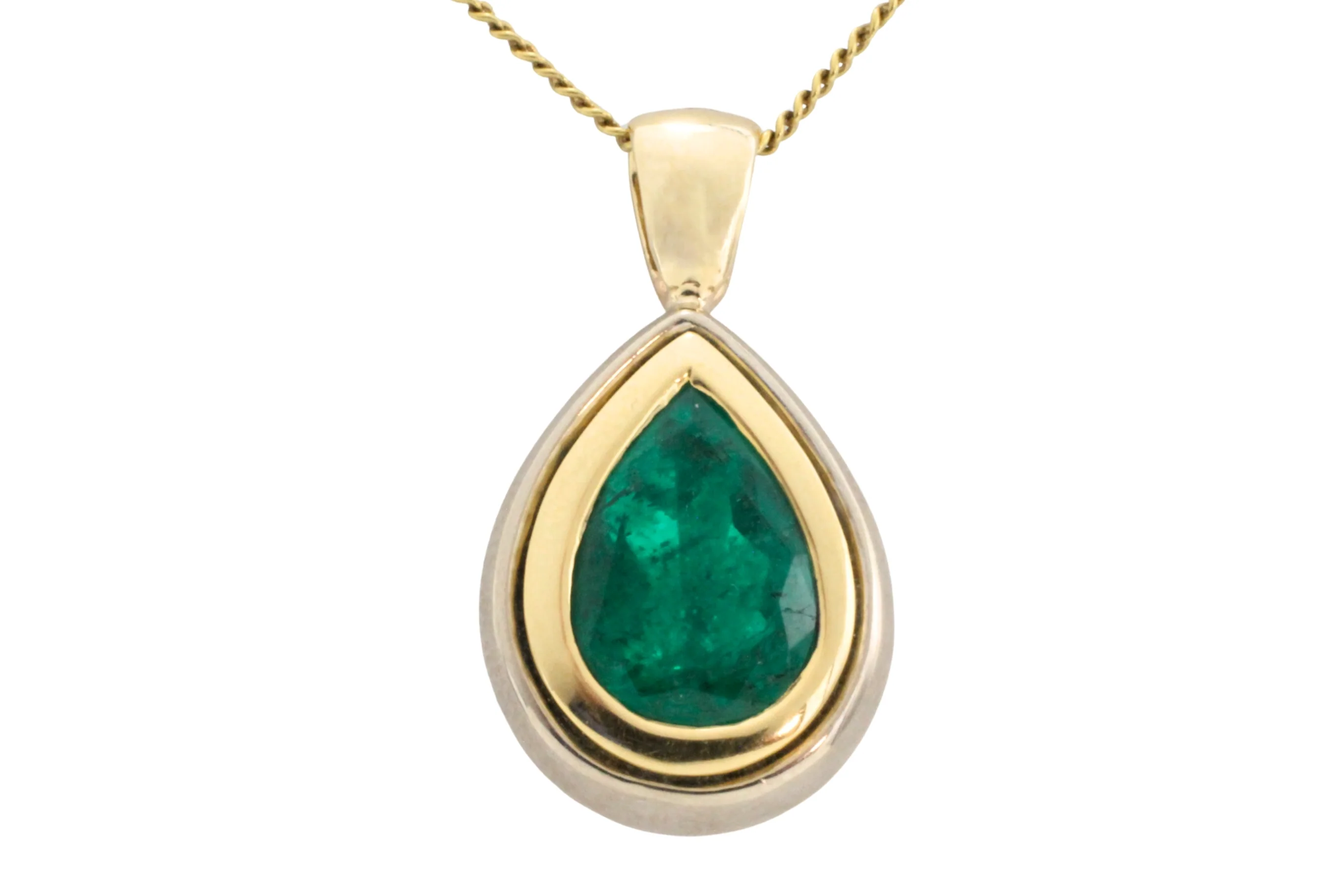 Emerald pendant in yellow and white gold
