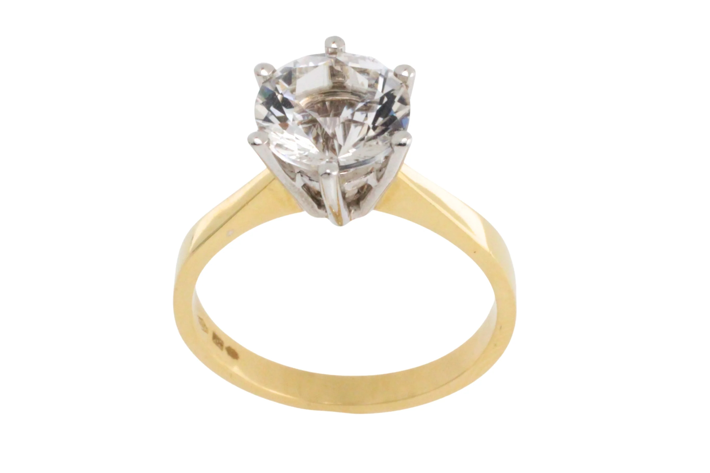 Gold solitaire ring with rock crystal stone