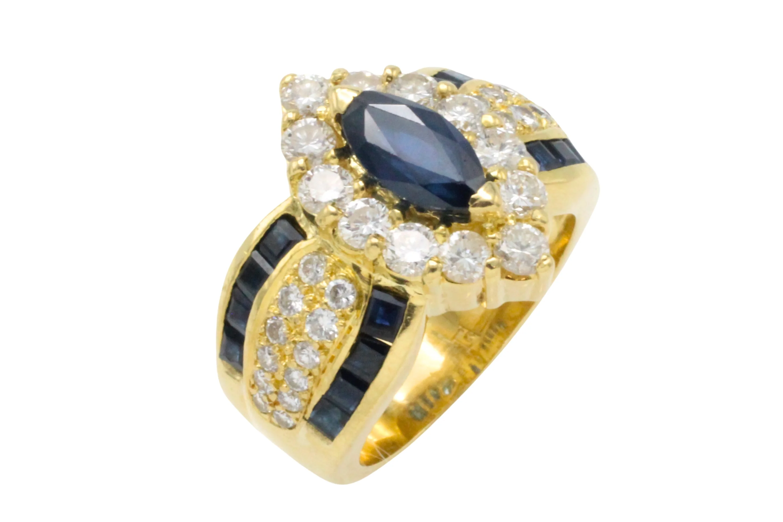 Marquise sapphire and diamond ring in 18 carat gold