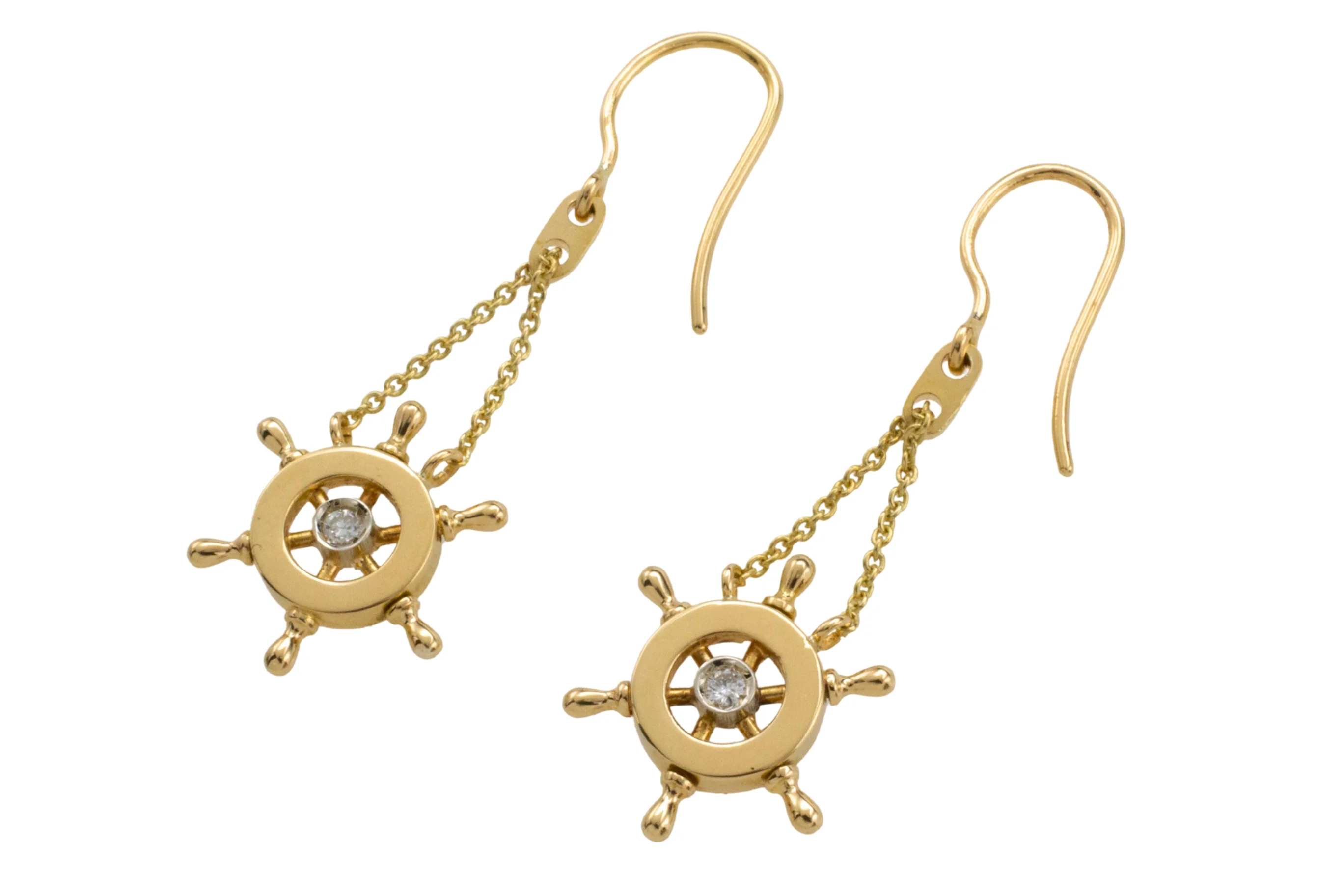 Ships wheel diamond earrings